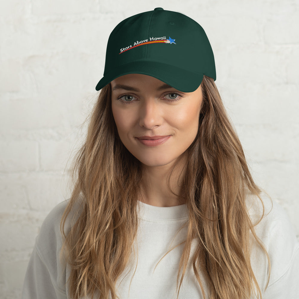 Model wearing a green Stars Above Hawaiʻi baseball cap with an embroidered English-language logo