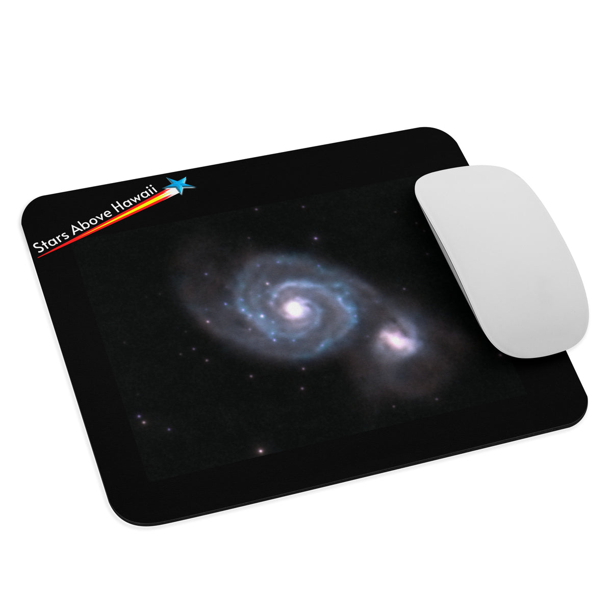 Computer mouse on a Whirlpool Galaxy astronomy mouse pad